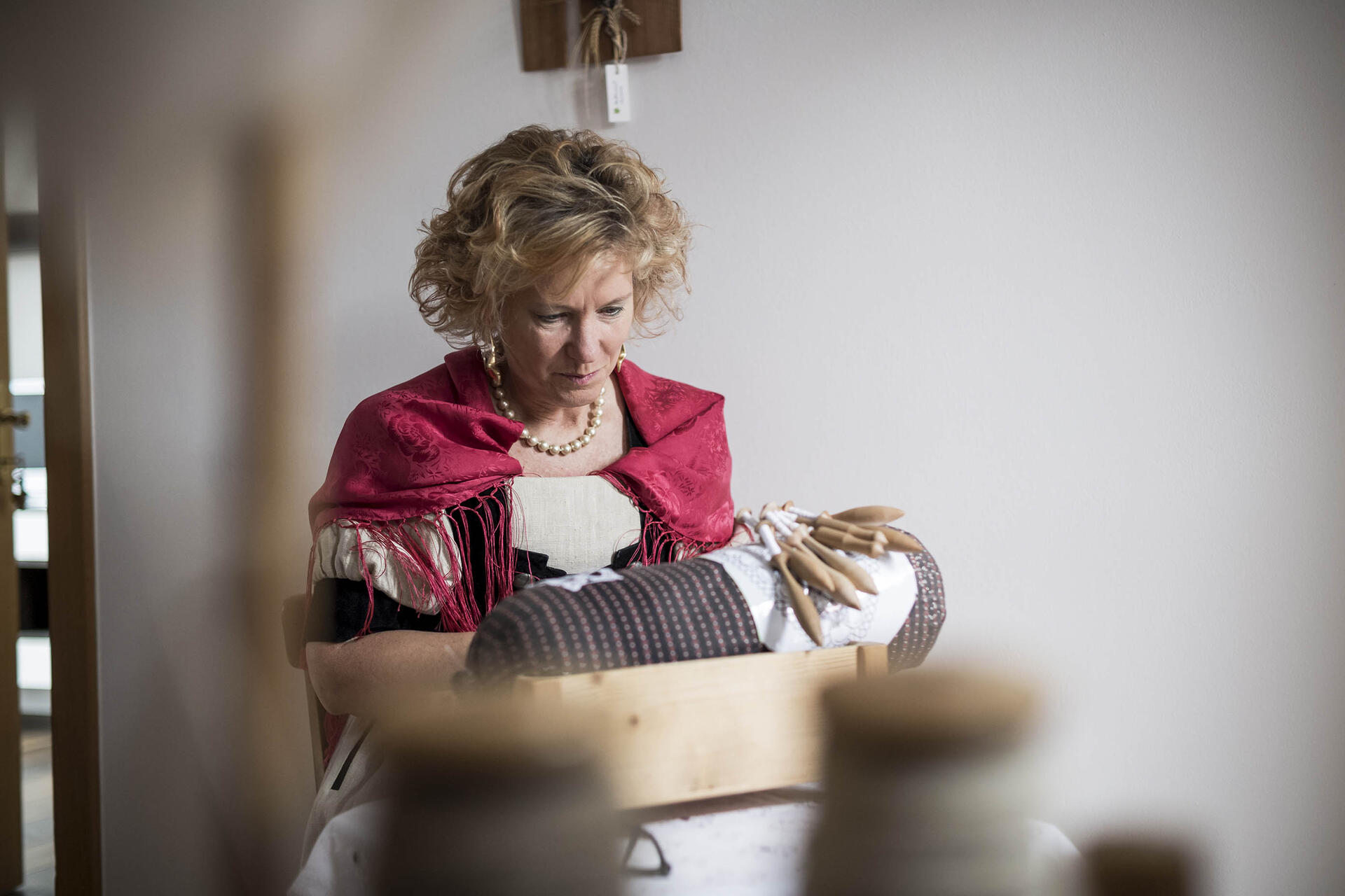 Woman making lace